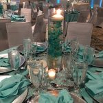 Wedding Reception Table with Green napkins and glassware