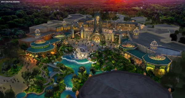 A Conceptual rendering aerial view of Celestial Park at Epic Universe, with glowing buildings surrounding a large water central pond. 