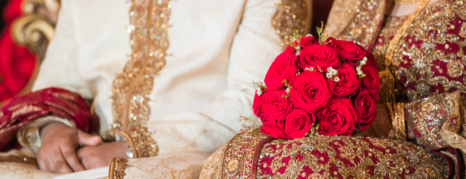 Indian bride holding flowers
