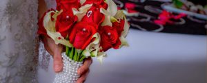 Red and White flowers wrapped in pearls