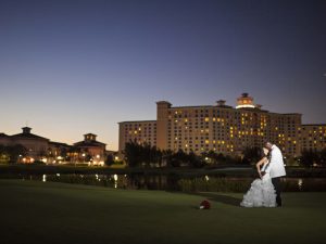 Wedding Couple at Night in front of Rosen Shingle Creek